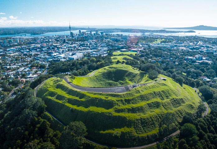 Aerial photo of Mt Eden, with Auckland city in the background