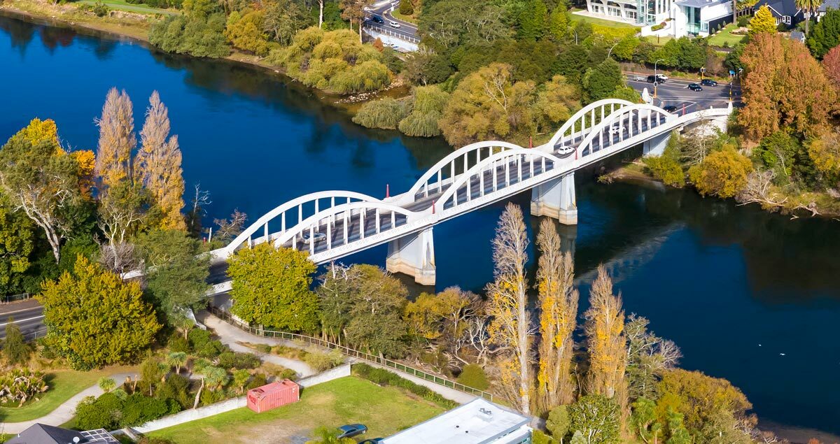 Aerial photo of a bridge crossing the Waikato River, in Hamilton New Zealand