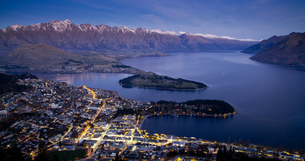 Photo of Queenstown lit up at night